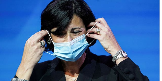 Dr. Rochelle Walensky, now director of the U.S. Centers for Disease Control and Prevention (CDC), removes her mask to speak.
