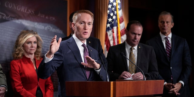 Sen. James Lankford, R-Okla., speaks as, L-R, Sen. Marsha Blackburn, R-Tenn., Sen. Mike Lee, R-Utah, and Sen. John Thune, R-S.D., look on during a news conference about COVID-19 vaccine mandates, at the U.S. Capitol Dec. 8, 2021 in Washington.