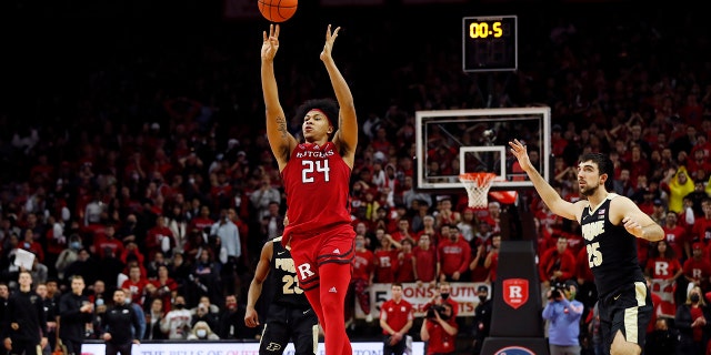 Rutgers forward Ron Harper Jr. (24) hits the game winning shot against Purdue during an NCAA college basketball game in Piscataway, N.J., Thursday, Dec. 9, 2021. Rutgers won 70-68.