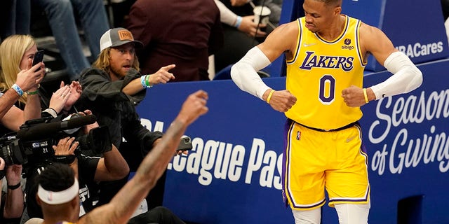 Los Angeles Lakers' Russell Westbrook celebrates after sinking a basket against Dallas on Dec. 15, 2021.