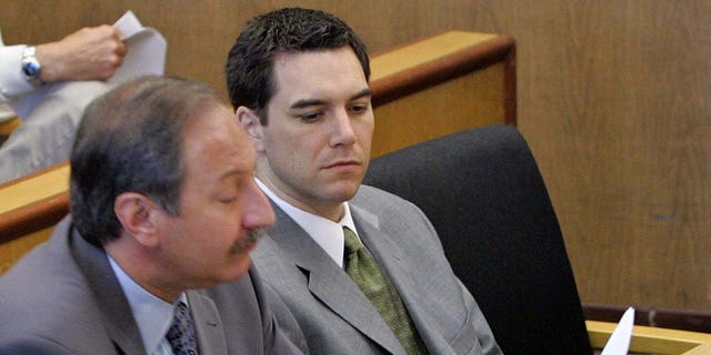 Scott Peterson (R) and his lawyer Mark Geragos are seen during defense closing arguments in the penalty phase of his murder trial at the courthouse in Redwood City, California December 9, 2004. Peterson was convicted of two counts of murder in the deaths of his wife Laci Peterson and their unborn child. The jury will deliberate after the Defense rests on what sentence to give Peterson. He was convicted of first degree murder for killing his wife and second degree murder for the death of their unborn son. He faces either life in prison or the death penalty. REUTERS/Fred Larson/POOL  SCM/GN