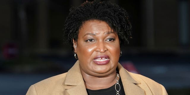 Stacey Abrams speaks to the media about the U.S. Senate runoff elections outside St. Paul's Episcopal Church in Atlanta, Georgia, Jan. 5, 2021. 