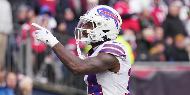 Stefon Diggs of the Buffalo Bills reacts after scoring a touchdown during the second quarter against the New England Patriots at Gillette Stadium Dec. 26, 2021, in Foxborough, Mass.