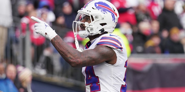 Stefon Diggs of the Buffalo Bills reacts after scoring a touchdown during the second quarter against the New England Patriots at Gillette Stadium Dec. 26, 2021, in Foxborough, Mass.