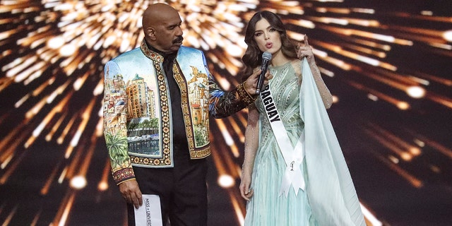 Nadia Ferreira of Paraguay, right, answers the last question as host Steve Harvey looks on during the 70th Miss Universe pageant, Monday, December 13, 2021, in Eilat, Israel. 