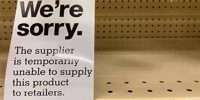 A sign is seen on the shelf at a CVS store in Queens, New York. (Photo by: Lindsey Nicholson/Universal Images Group via Getty Images)