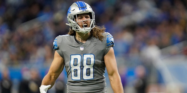 Detroit Lions tight end T.J. Hockenson reacts after his touchdown during the first half against the Minnesota Vikings Sunday, Des. 5, 2021, in Detroit.