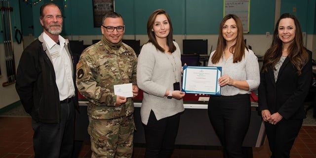 The couple was awarded as the Boys and Girls Clubs of America military family of the year for their work as foster parents. (Lenny Juliano/Courtesy of the U.S. Air Force)