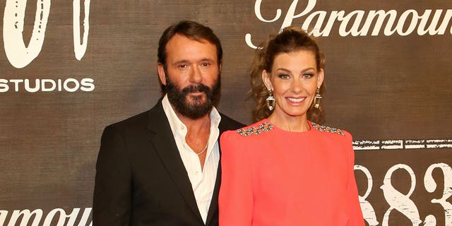 Tim McGraw and Faith Hill attend the world premiere of "1883" at the Encore Beach Club at Encore Las Vegas on December 11, 2021 in Las Vegas, Nevada.