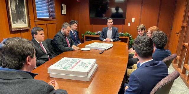 Sen. Tom Cotton of Arkansas meets with the Saint Anselm College Young Republicans, on Dec. 3, 2021 in Goffstown, New Hampshire