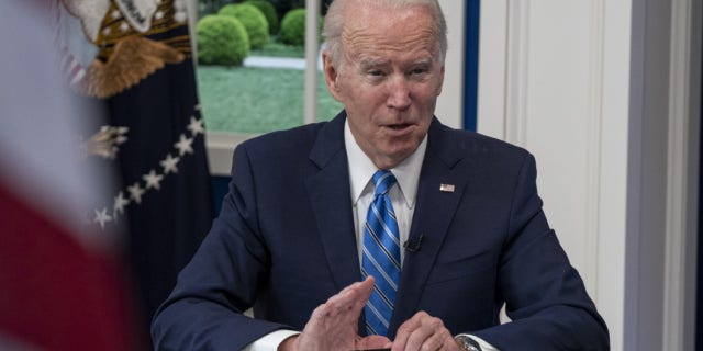 U.S. President Joe Biden speaks while joining the White House Covid-19 Response Team's call with the National Governors Association discussing the Omicron variant in the Eisenhower Executive Office Building in Washington, D.C., U.S., on Monday, Dec. 27, 2021.  Photographer: Ken Cedeno/UPI/Bloomberg via Getty Images