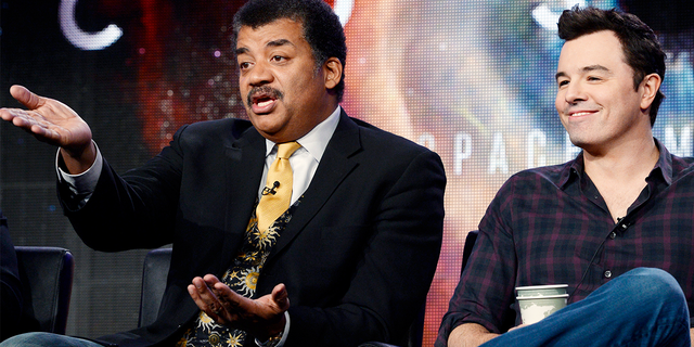 FILE – Host Neil DeGrasse Tyson (L) and Seth MacFarlane, executive producer of "Cosmos", participate in Fox Broadcasting Company's part of the Television Critics Association (TCA) Winter 2014 presentations in Pasadena, California, January 13 , 2014.