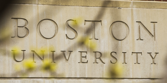 Signage is displayed at Boston University in Boston, Mass., in April 2020.