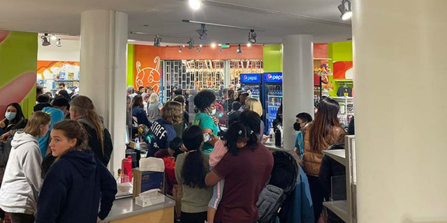 People sheltered in the Nickelodeon Shop at the Mall of America Friday evening. (Courtesy @zr0XPerience)