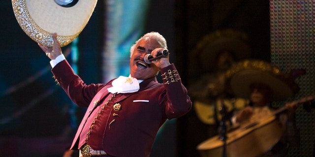 FILE -  Vicente Fernandez performs at a free concert during Valentine's Day in Mexico City's on Feb. 14, 2009, file photo, singer. On Tuesday, Oct. 8, 2016.  The Mexican singer died Sunday at 81 years of age in Guadalajara, Mexico, his family announced in a statement. 