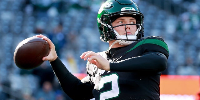 Zach Wilson, #2 of the New York Jets, warms up before the game against the Jacksonville Jaguars at MetLife Stadium on December 26, 2021 in East Rutherford, New Jersey.