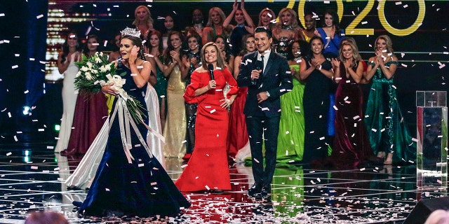 Virginia's Camille Schrier walks the stage after winning the Miss America competition at the Mohegan Sun casino in Uncasville, Connecticut, Dec. 19, 2019.