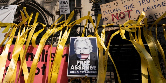 LONDON, ENGLAND - AUGUST 11:  Supporters gather outside as the High Court hears a US appeal in the extradition of WikiLeaks founder Julian Assange, at Royal Courts of Justice, Chancery Lane on August 11, 2021 in London, England.