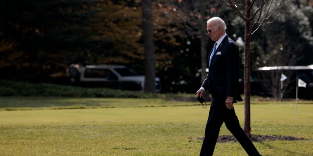 President Joe Biden walks to Marine One before departing from the White House on Dec. 2, 2021 in Washington.