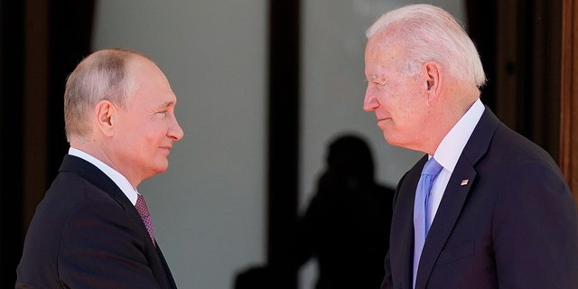 President Joe Biden, right, and Russian President Vladimir Putin greet each other in Geneva, Switzerland, June 16, 2021.