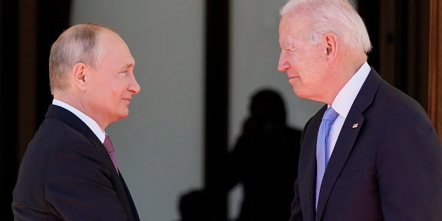 President Joe Biden, right, and Russian President Vladimir Putin greet each other in Geneva, Switzerland, June 16, 2021.