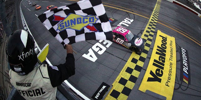 Brown won the Sparks 300 under caution after the race was shorted from 113 laps to 107 laps due to darkness.