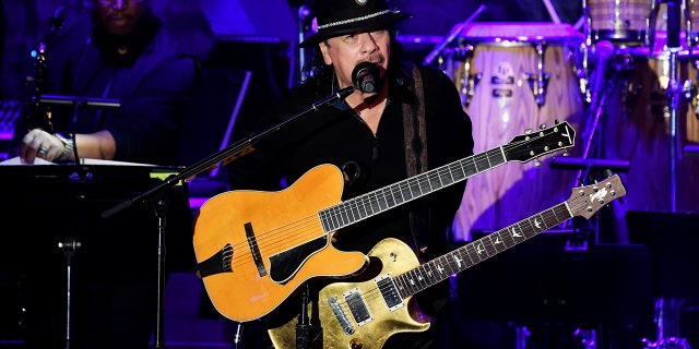 Carlos Santana performs on stage during pre-Grammy and Grammys tribute to industry icons in honor of Sean "Didi" Combs on January 25, 2020, in Beverly Hills, California.