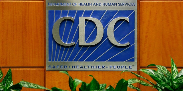 A podium with the logo for the Centers for Disease Control and Prevention  at the Tom Harkin Global Communications Center on October 5, 2014 in Atlanta, Georgia. 