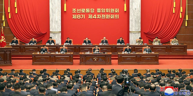 North Korean leader Kim Jong Un, center, attends a meeting of the Central Committee of the ruling Workers’ Party in Pyongyang, North Korea on Monday, Dec. 27, 2021. 