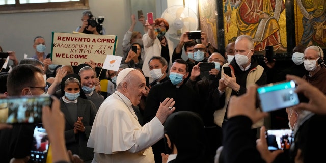 Pope Francis arrives to attend a ceremony at the Maronite Cathedral of Our Lady of Graces in Nicosia, Cyprus, Thursday, Dec. 2, 2021. 