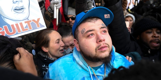 Damik Bryant, brother of Daunte Wright, look on after the guilty verdict was delivered Thursday, Dec. 23, 2021 outside the Hennepin County Government Center in Minneapolis.