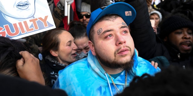 Damik Bryant, brother of Daunte Wright, look on after the guilty verdict was delivered Thursday, Dec. 23, 2021 outside the Hennepin County Government Center in Minneapolis.