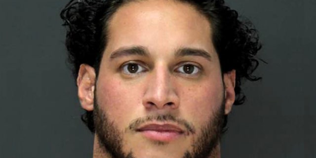 Dino Tomassetti is accused of shooting his father in the back and mother on Christmas morning.