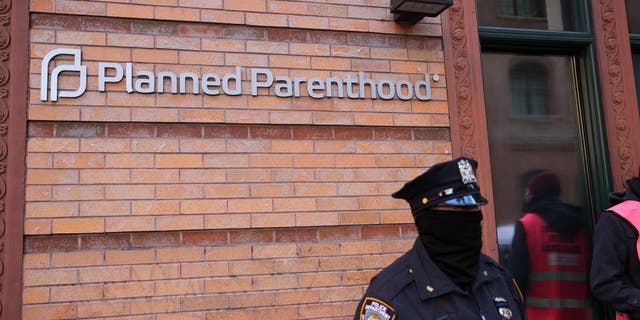 Members of St. Patrick's Old Cathedral basilica gather outside the Planned Parenthood Clinic on December 4, 2021 to support the abortion law in New York City.  (Photo by Tayfun Coskun / Anadolu Agency via Getty Images)