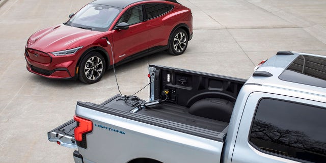 The F-150 Lighning can share electricity with other vehicles via a 240v outlet powered by a built-in 9.6 kilowatt inverter.