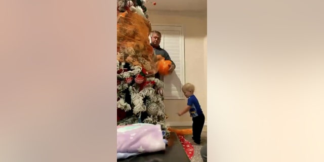 Kooper helped his mom buy and decorate the tree.