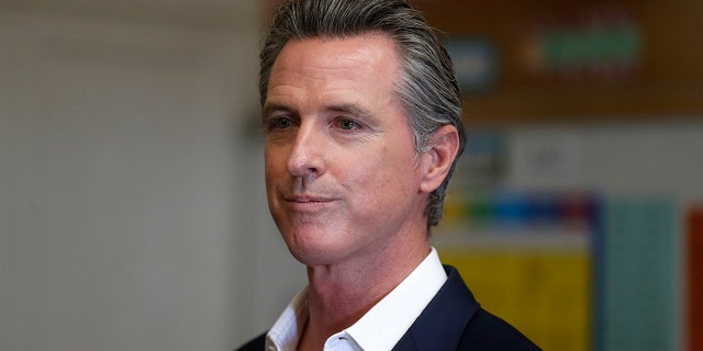 Gov. Gavin Newsom pauses while speaking to the press during a visit to Melrose Leadership Academy in Oakland, California, on Wednesday, Sept. 15, 2021. The governor recently gave his thoughts on prosecuting shoplifting crimes.