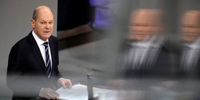 German Chancellor Olaf Scholz delivers a speech during a meeting of the German federal parliament, Bundestag, at the Reichstag building in Berlin, Germany, Dec. 15, 2021. 