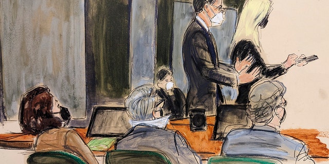 In this courtroom sketch, Ghislaine Maxwell, seated, left, watches her defense attorneys Christian Everdell and Laura Menninger, right, argue regarding a jury note that asked for clarity about a charge during her sex trafficking trial, Monday, Dec. 27, 2021, in New York. 