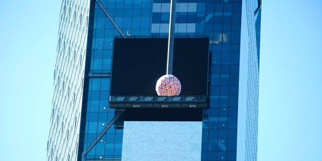 The Times Square Ball drops from the top of One Times Square in New York City.