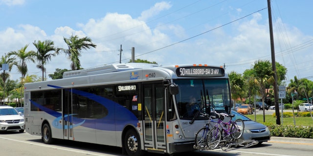 FILE - A Broward County Transit bus in Wilton Manors, Florida.
