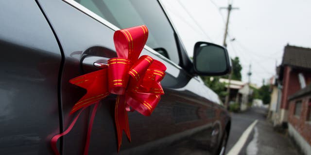 Car decorations should be securely fastened and not cause a distraction on the road, according to Richard Reina, a product training director at CARiD.com.