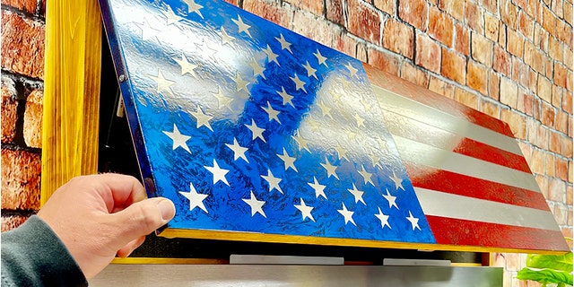 The father-son team create their unique American flag designs and products in their shops in Wisconsin — and ship them to customers from all over. 