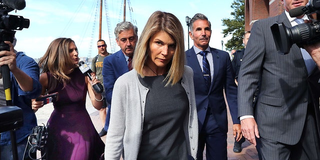 Lori Loughlin has been photographed leaving courthouse during the college admissions scandal.