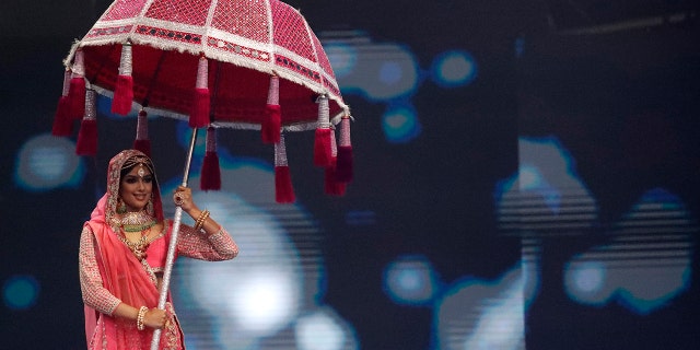 India's Harnaaz Sandhu performs as she takes part in the National Costume portion of the Miss Universe pageant, in Eilat, Israel, Friday, Dec. 10, 2021.