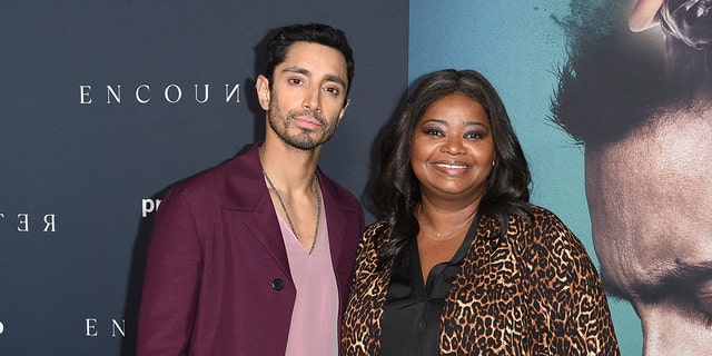 Riz Ahmed, left, and Octavia Spencer arrive at the LA premiere of "Encounter" at the Directors Guild of America on Thursday, Dec. 2, 2021, in Los Angeles. 