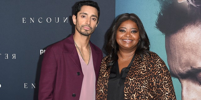 Riz Ahmed, left, and Octavia Spencer arrive at the LA premiere of "Encounter" at the Directors Guild of America on Thursday, Dec. 2, 2021, in Los Angeles. 