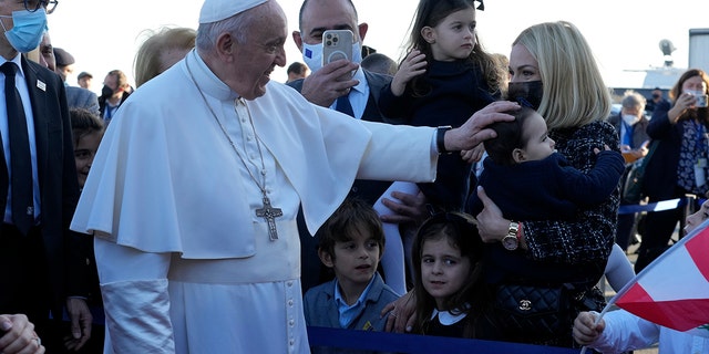Pope Francis arrives at the airport in Larnaca, Cyprus, Thursday, Dec. 2, 2021. 