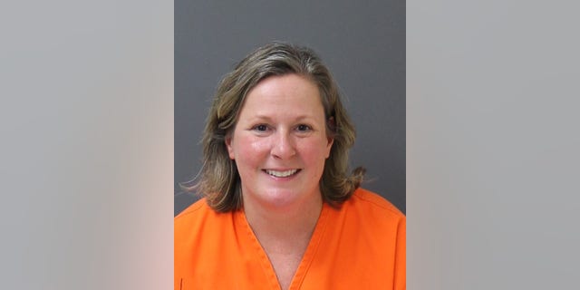 Kim Potter booking photo, Dec. 23, 2021. Potter is being held at a correctional facility in Shakopee, Minnesota, while she awaits sentencing.  (Minnesota Department of Corrections)