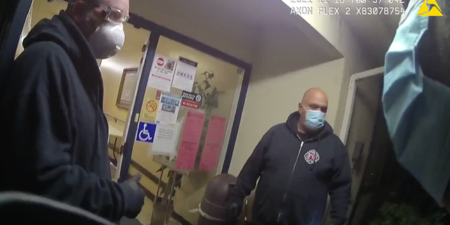 The paramedics from the Rialto Fire Department stayed outside the care center with their masks on